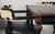 Hooker Furniture Ebonized Leather Games Table & Four Cowhide Armchairs A striking five-piece games table ensemble by...