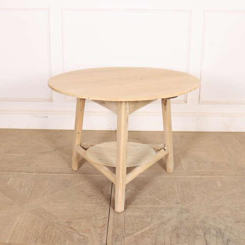 Good 19th century Welsh pine cricket table with a scrubbed bleached finish. 1820. This piece is designed in the style of...