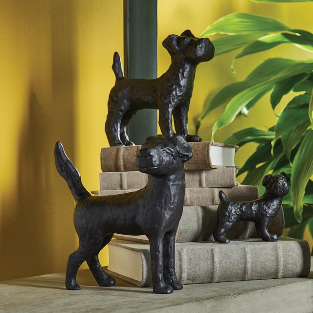 This set of three hounds stands alert, ready for a signal from their master. A regal accent for library, study or desk...