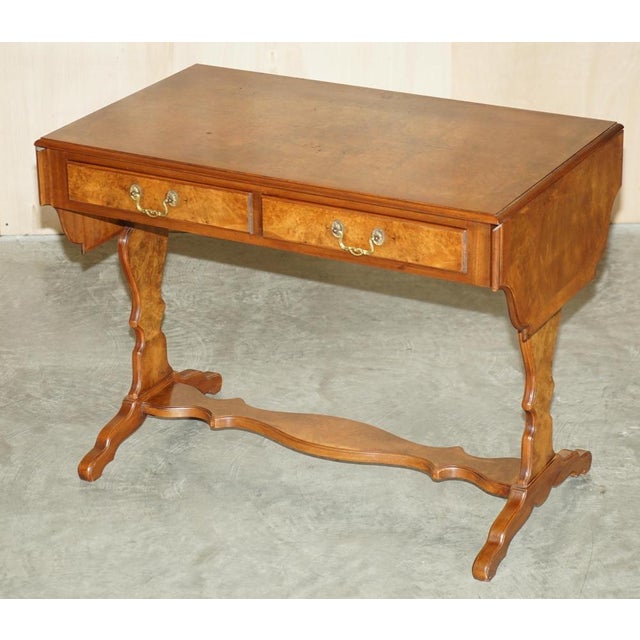 We are delighted to offer for sale this lovely vintage Bevan Funnell, Burr Walnut, extending sofa / occasional table. A...