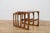 This set of three teak nesting tables was designed by R. Bennett for the renowned British manufacturer G-Plan during the...