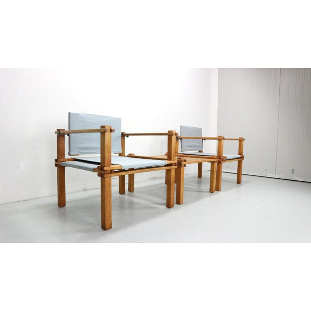 Set of two Safari chairs with table as part of the 'Farmer' series designed by Gerd Lange in 1965, and produced by German...