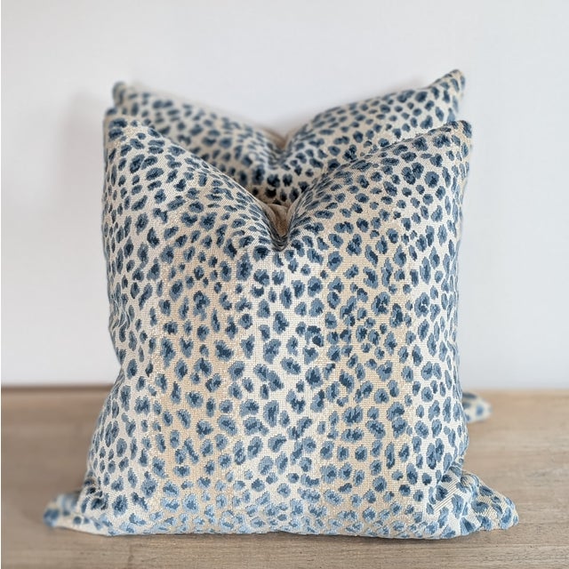 Cowtan & Tout ocelot cut velvet pillows in azure, with coordinating natural linen backs. Invisible zippers and...