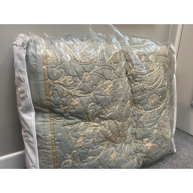 Coverlet, aqua Cal King, with swirled dusty gold embroidery. (Product is new and shown on bed for display purposes only....