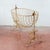 This charming vintage wrought iron crib, dating back to the first half of the 20th century, is an antique piece with an...