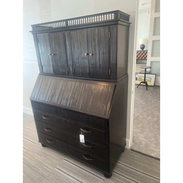 This secretary is a classic in it's dark brown Khaviar Finish and Antique Brass Hardware. Multiple drawers and door for...