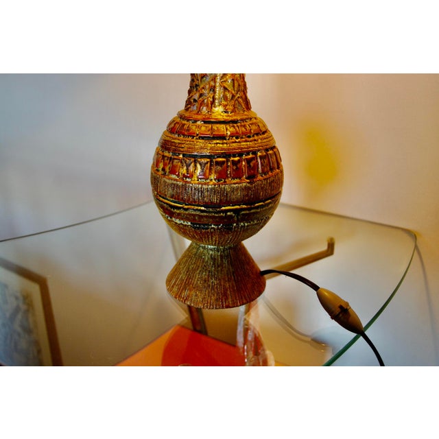 Table lamp with its original lampshade in fairly good condition. The height indicated is that of the ceramic without the...