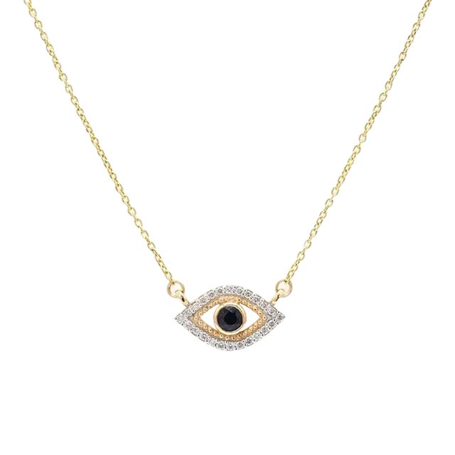 Modern Chic 14k Yellow Gold Blue Sapphire Diamond Halo Evil Eye Necklace For Sale