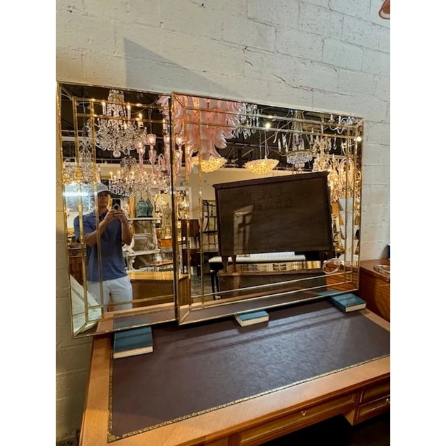 Lovely Italian designer brass mirror. Creates a very polished look! Very fine quality. There are 4 available. 43w x 47h