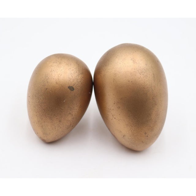 Vintage entry egg shaped door knobs made of bronze with a brushed finish. Good condition with surface wear from prior use....