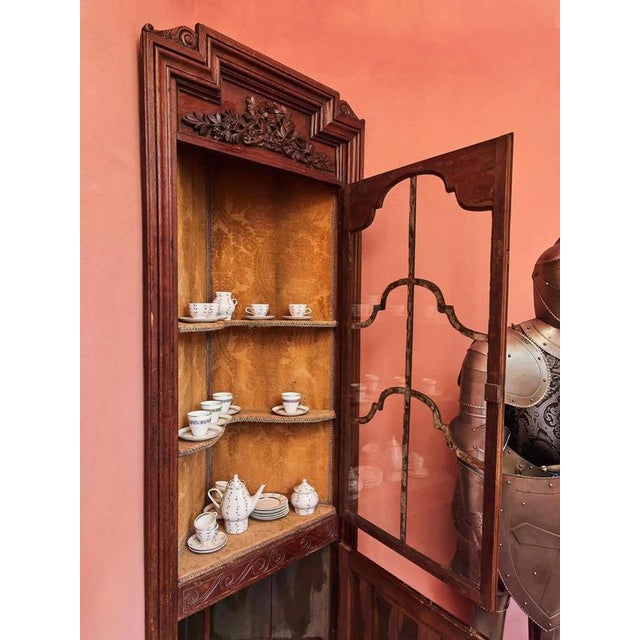 Hand-carved baroque corner cabinet. Excellent artistic and craft quality of work. The cabinet is carved from solid select...