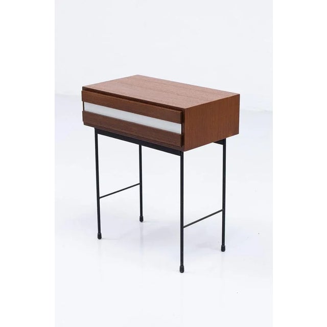 Rare and early side / bedside table designed and manufactured by Hans-Agne Jakobsson in Sweden, ca 1950s. Made from teak,...