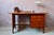 This Italian desk, of compact dimensions, combines presence and manufacturing quality. Designed by Edmondo Palutari, it...