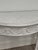 Louis XVI Ornately Carved Wood Demi-Lune With White Gesso Finish with Slight Distressing to Finish (See Photos).