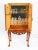 This is a fantastic antique burr walnut cocktail cabinet with wonderful hand carved decoration and a set of glassware, by...