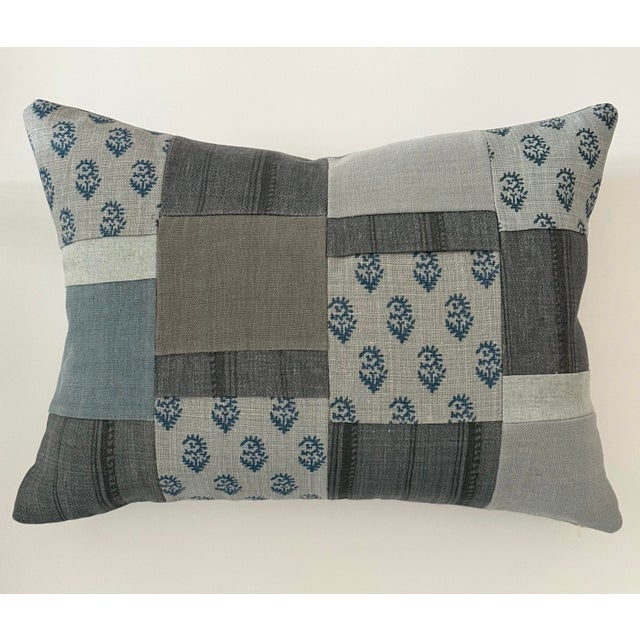 A one-of-a-kind pillow born from a true labor of love. The front is a patchwork of all-linen fabrics by acclaimed interior...