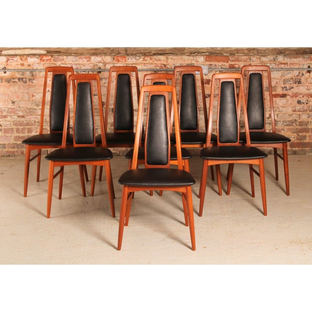 A set of 8 danish teak ‘eva’ dining chairs designed by niels koefoed, dating from the 1970s. The elegantly curved frames...