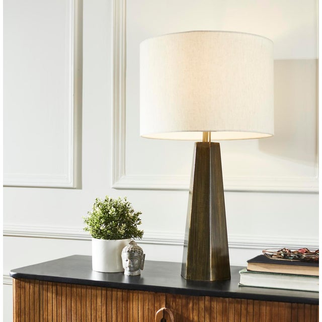Illuminate your space with the Jandean 27 inch brown iron table lamp, a delightful addition to any room. Designed to catch...