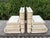 Pair Of Maitland Smith Tessellated Travertine And Brass Bookends. We offer a rare pair of Post-Modern tessellated...