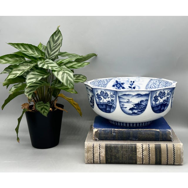 Fantastic vintage blue and white Japanese porcelain bowl with a striking geometric, faceted form. Decorated with classic...