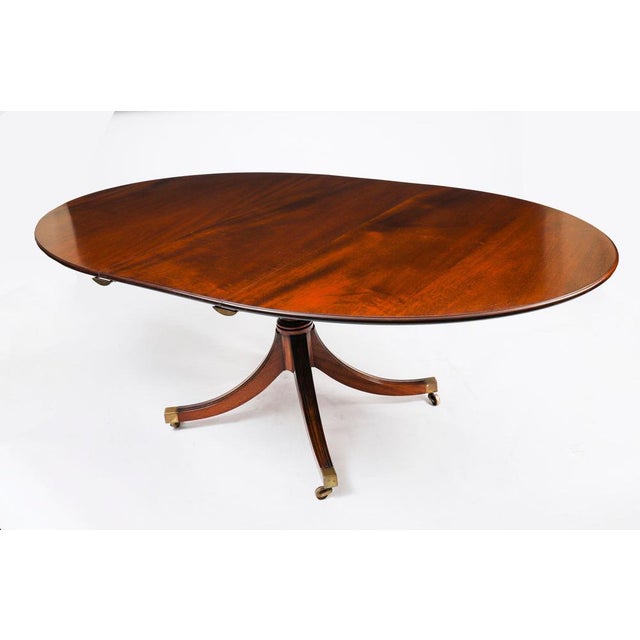 This is a fabulous vintage regency revival dining table, made by the master cabinet maker william tillman in the 1990s and...