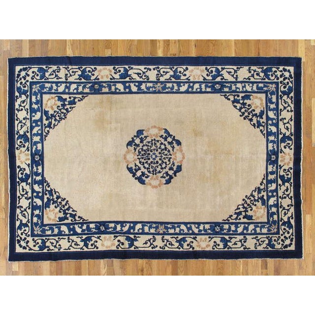 Antique Chinese carpets were woven in classical patterns, with their fret borders, shou medallions and other far-eastern...