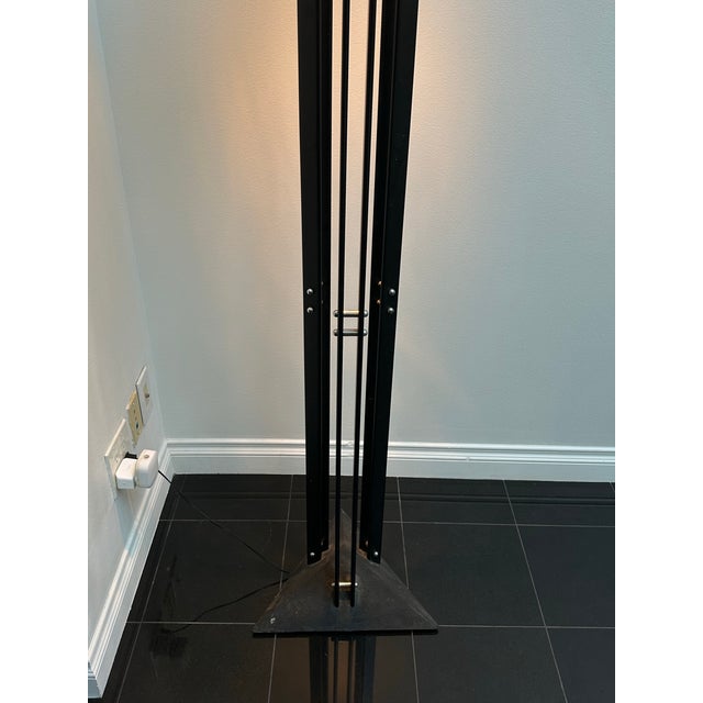 A striking 1987 “Echoes of Vienna” floor lamp, designed by Robert Sonneman for George Kovacs. Featuring a sculptural black...