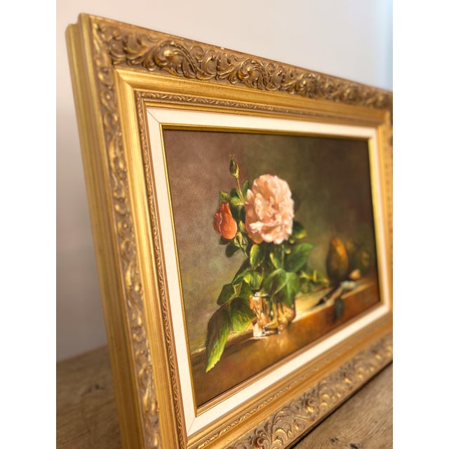 Mid-century French still life oil painting featuring a delicate pink rose, ripe pears, and rich, earthy tones. Set in an...