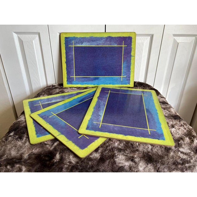 Set of four vibrant blue and green Pimpernel placemats with cork lined bottoms. Perfect for anyone who loves a statement...
