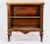 A Neoclassical style marble top bookstand, circa 1900, the open case with two tiers and rising on metal mounted fluted...