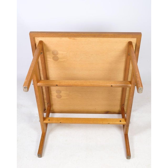 Square coffee table of veneered oak, designed by børge mogensen, manufactured by fdb møbler from around the 1960s....