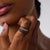 This vibrant vintage multi-band ring is a playful and distinctive 1980’s design, beautifully combining sapphires, rubies,...