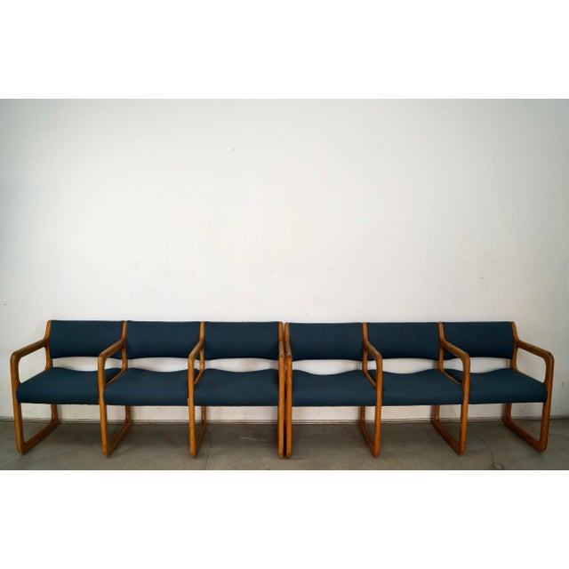 Pair of vintage Midcentury Modern triple seating tandem benches for sale. We have two for sale.They're made of solid oak,...