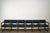 Pair of vintage Midcentury Modern triple seating tandem benches for sale. We have two for sale.They're made of solid oak,...