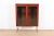 A sleek and stylish mid-century Danish Modern lighted bookcase or display cabinet By Skovby Møbelfabrik Denmark, Circa...