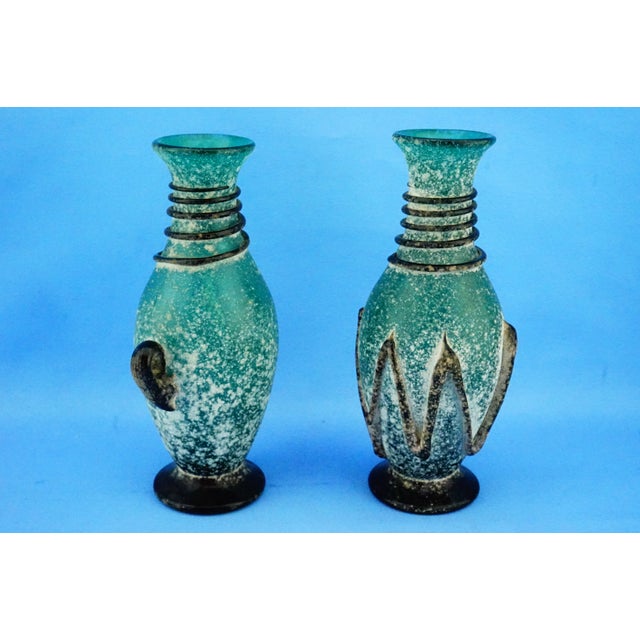 Height: 23.3 - 23.7 cm; width: 14 - 10 cm; depth: 9 - 10 cm; total weight: 1.477 kg a stunning pair of murano glass vases,...