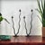 Pair of two-branch wrought iron candlesticks made by Hysteria Design in France in the 1980s. The style is both brutalist...