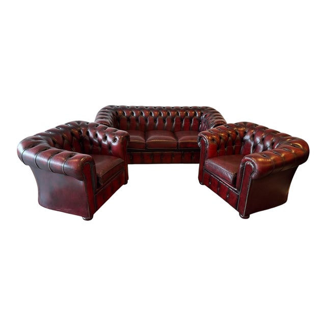 Genuine leather with deep button tufting. Traditional Chesterfield with rolled arms and studded detailing One three-seater...