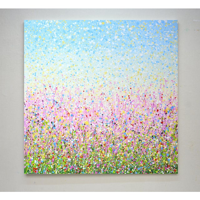 July month. Summer landscape: a pink field, a feast of bright flowers and herbs on a summer day create an atmosphere of...
