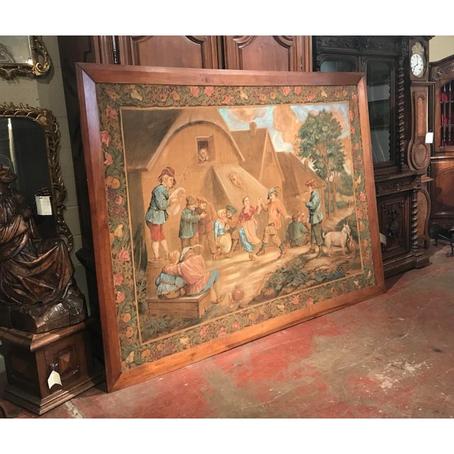 This large antique painted canvas captures the spirited atmosphere of a European village celebration in the tradition of...