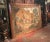 This large antique painted canvas captures the spirited atmosphere of a European village celebration in the tradition of...