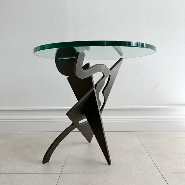 Pucci De Rossi (1947-2013) Occasional table with two interlocking panels of ⅝” thick steel cut into abstract forms with...