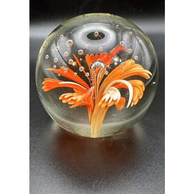 his really is a bright and beautiful paperweight that incorporates the “bullicante” effect (see below) floating — in a...