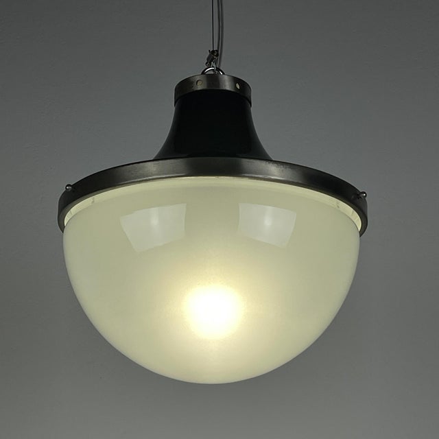 Mid-century pendant lamp “pi cavo“ by sergio mazza for artemide made in italy in the 1960s. sergio mazza was born in milan...