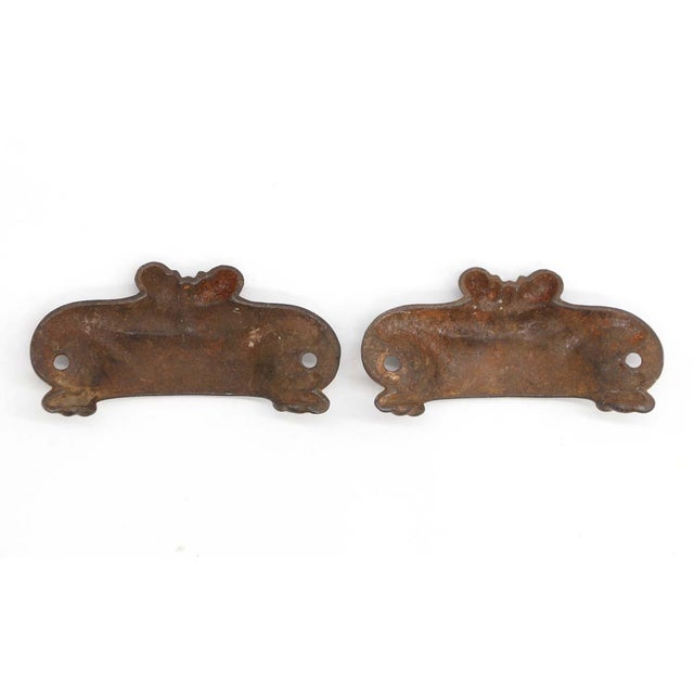 Black cast iron bin drawer pulls with a Victorian design. Good condition with appropriate wear from age. Priced as a pair....