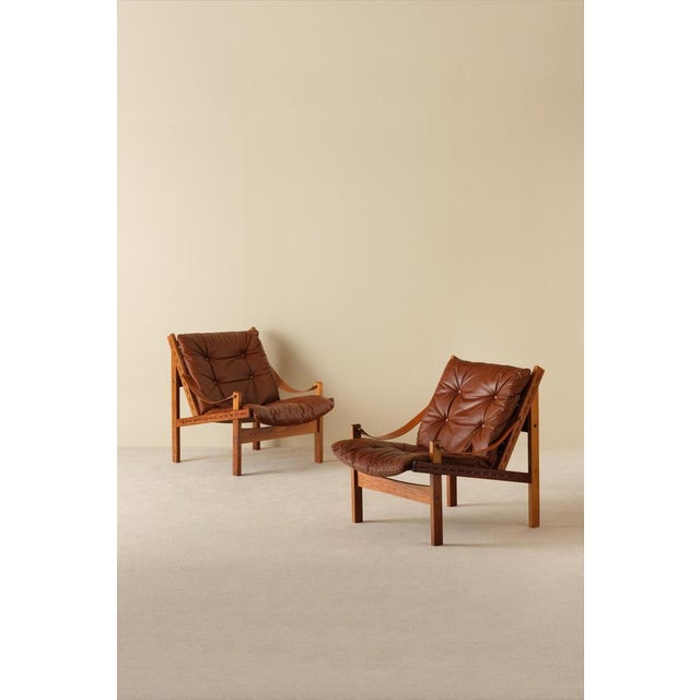 Great pair of safari chairs model Hunter designed by Torbjørn Afdal, produced by Bruksbo, Norway. Original leather...