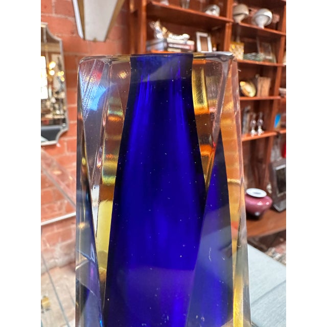 The Small Decorative Italian Murano Vase by Mandruzzato, crafted in the 1960s, is a remarkable example of Murano glass...