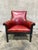 Exceptional custom club. The chair is a study in restrained, confident design: a curved, enveloping back and rolled arms...
