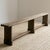 Vintage long and narrow wooden bench from France. This dark wood rustic bench would be fantastic in a hallway or at the...