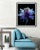 A Color photograph of a blue and purple flower on black. Printed on 310gsm Archival Fine Art Paper.